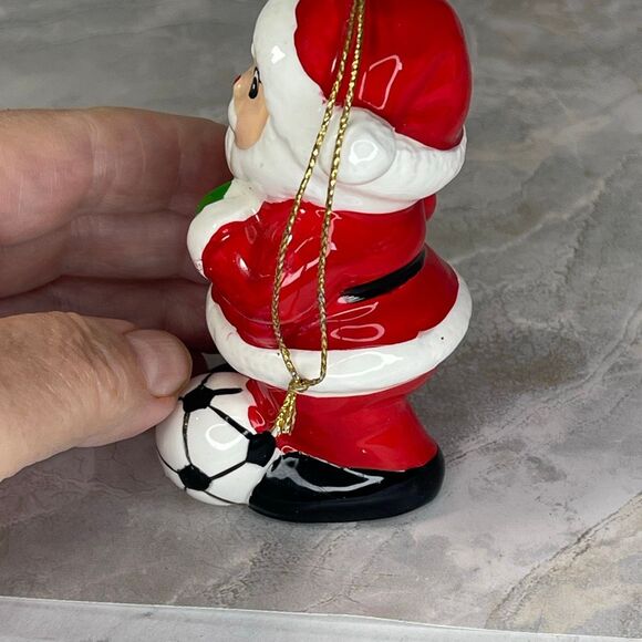 Vintage 1980’s hand painted Santa kicking a soccer ball. - Picture 7 of 9